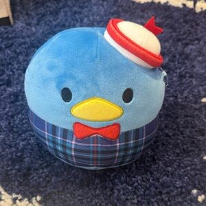 Tuxedosam Squishmallow Sanrio "Plaid Squad" collection.